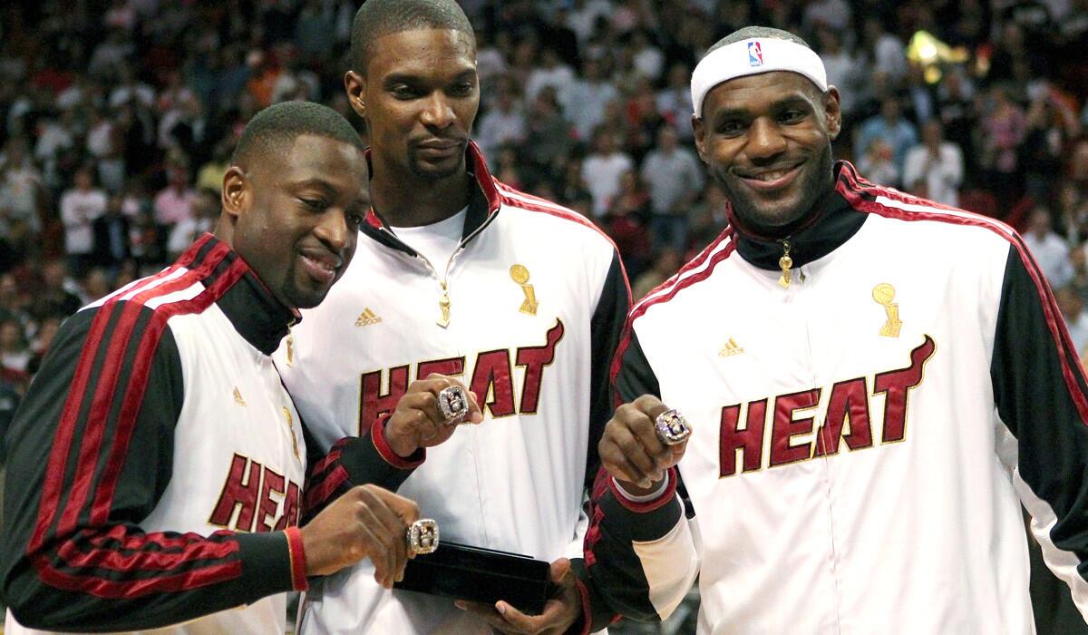 LeBron James won two titles in four NBA Finals appearances with Dwyane Wade, left, Chris Bosh, center, and the Miami Heat.