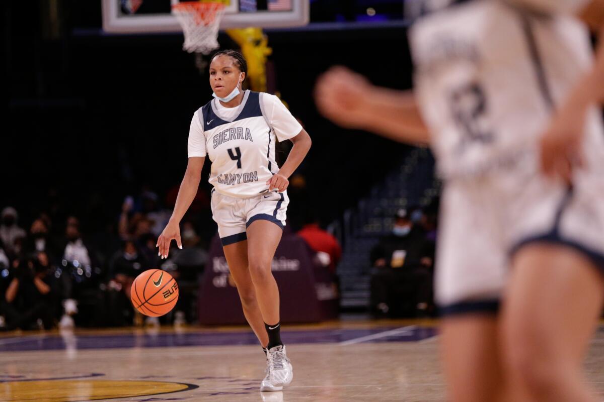 Sierra Canyon's MacKenly Randolph controls the ball during a win over Christ the King.