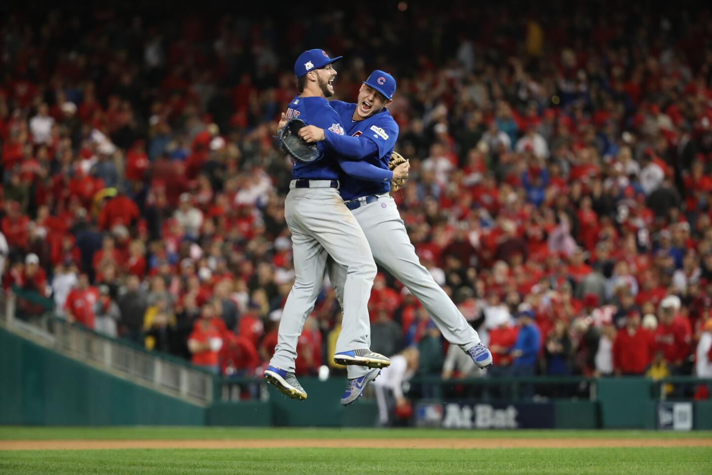 Kris Bryant and Anthony Rizzo embrace after the Cubs beat the Nationals to win Game 5 of the NLDS on Oct. 12, 2017.