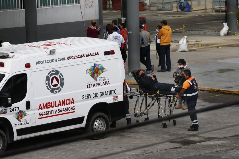 A patient arrives at a hospital in Mexico City.