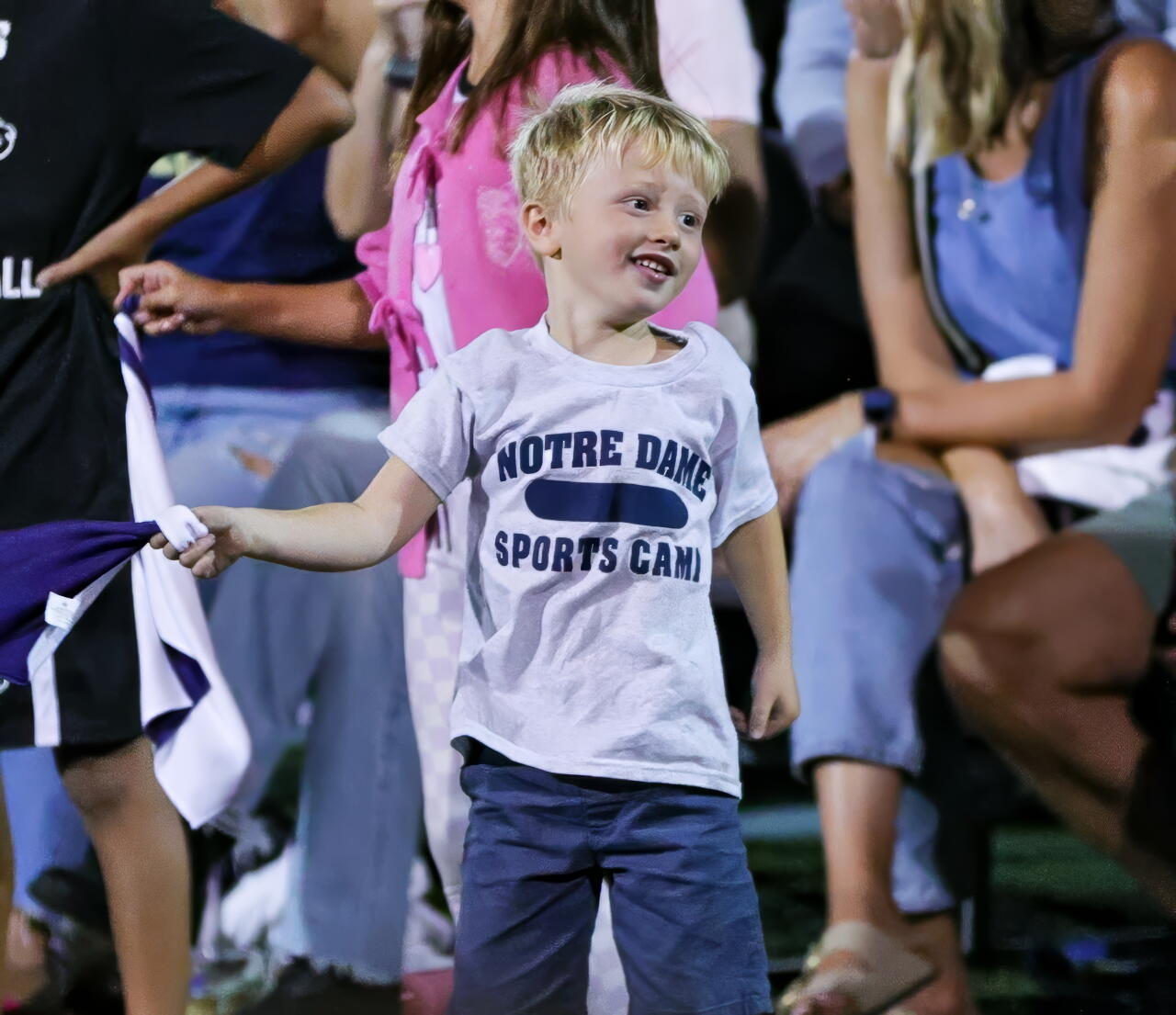 Over 1,000 fans gathered Saturday for an outdoor girls’ volleyball match at Sherman Oaks Notre Dame on the baseball field.