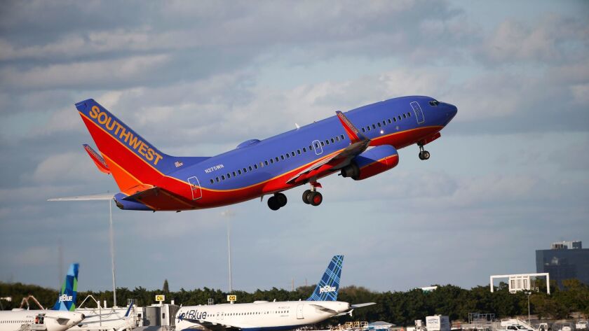 Southwest Airlines says it will stop overbooking flights, but it didn't say when the policy change will kick in.