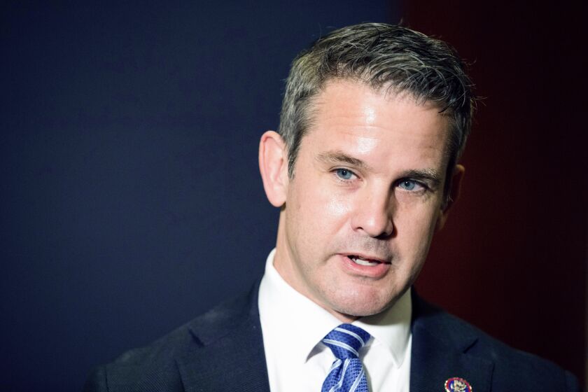 FILE - In this May 12, 2021 file photo, Rep. Adam Kinzinger, R-Ill., speaks to the media at the Capitol in Washington. Kinzinger a critic of Donald Trump who is one of two Republicans on the panel investigating the deadly Capitol attack, announced Friday, Oct. 29, that he will not seek re-election next year. (AP Photo/Amanda Andrade-Rhoades, File)
