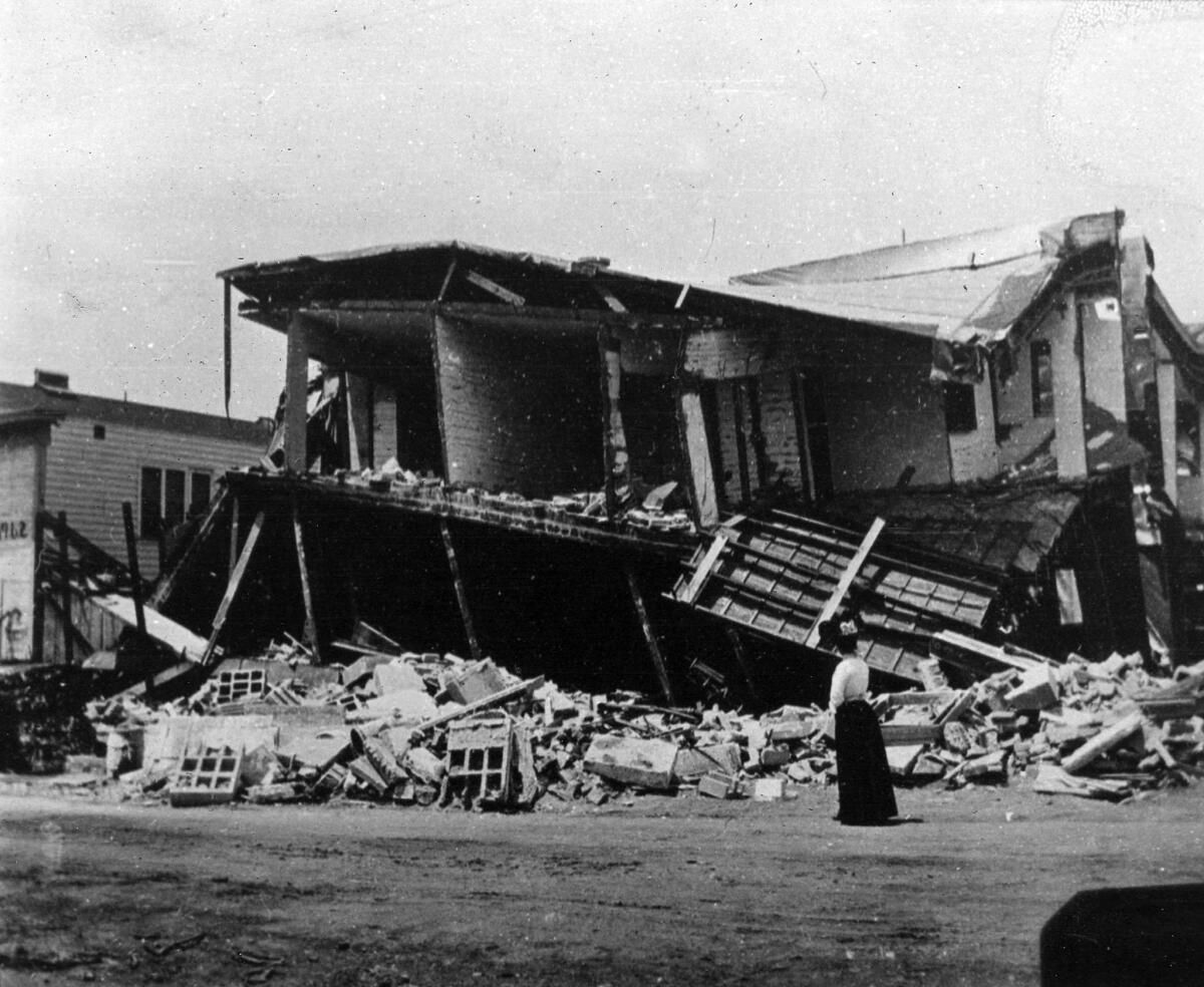 A frame house is destroyed in the 1906 San Francisco earthquake.
