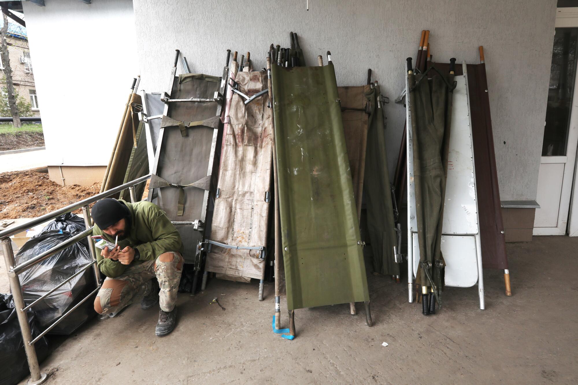 At a front-line military hospital in Luhanstkyy, Ukraine, stretchers line the wall at the entrance to the emergency room.