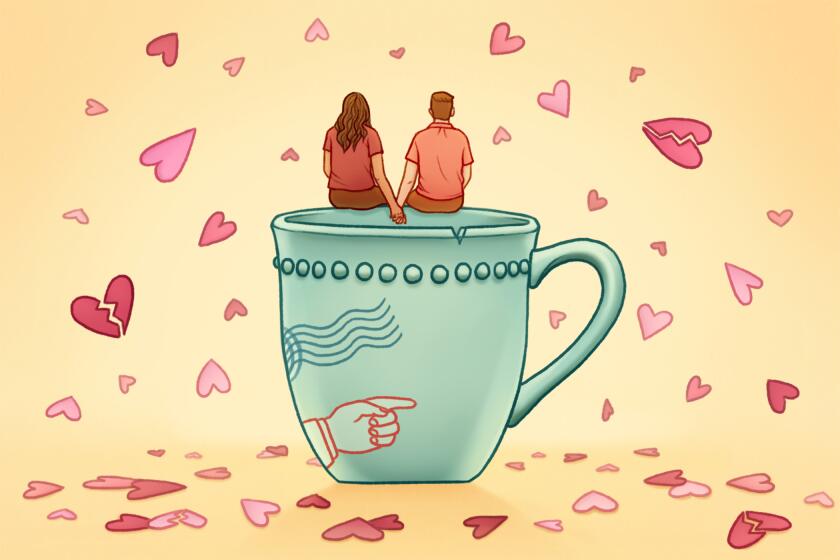 Couple sitting on the edge of a chipped coffee mug.