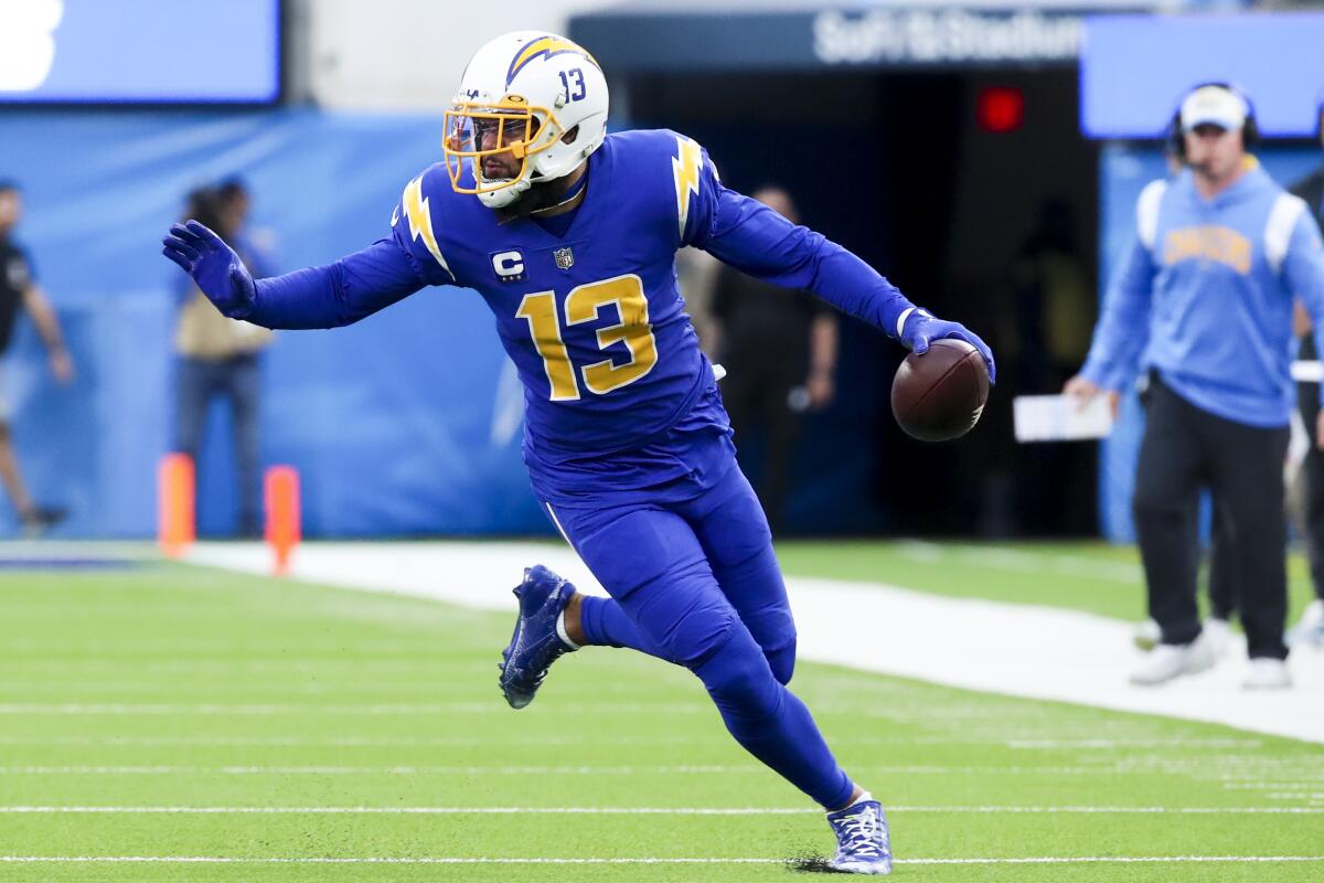 Chargers wide receiver Keenan Allen runs after a catch.