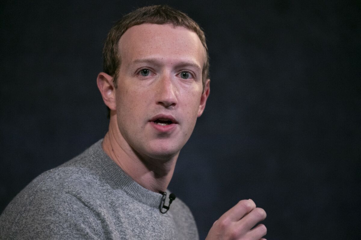 FILE - Facebook CEO Mark Zuckerberg speaks at the Paley Center in New York, Oct. 25, 2019. The nonprofit that distributed most of the $350 million in donations from Facebook founder Mark Zuckerberg to election offices in 2020 says it won't disburse similar donations this year. (AP Photo/Mark Lennihan, File)