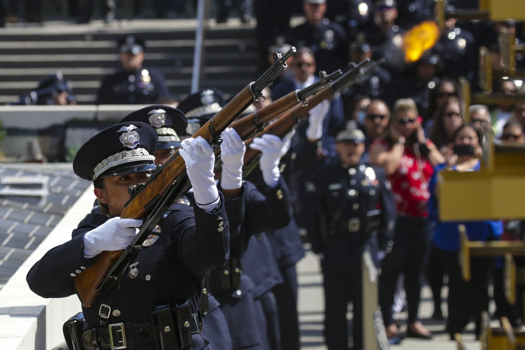 LAPD Rifle Volley presents 21-gun salute at a memorial ceremony to honor the 238 LAPD officers.