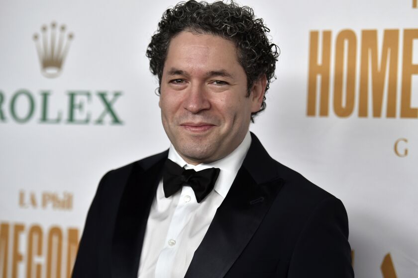 FILE - Gustavo Dudamel appears at the Los Angeles Philharmonic Homecoming Concert & Gala in Los Angeles on Oct. 9. 2021. Dudamel will become music director of the New York Phlharmonic for the 2026-27 season, ending a tenure with the Los Angeles Philharmonic that began in 2009. (Photo by Richard Shotwell/Invision/AP, File)