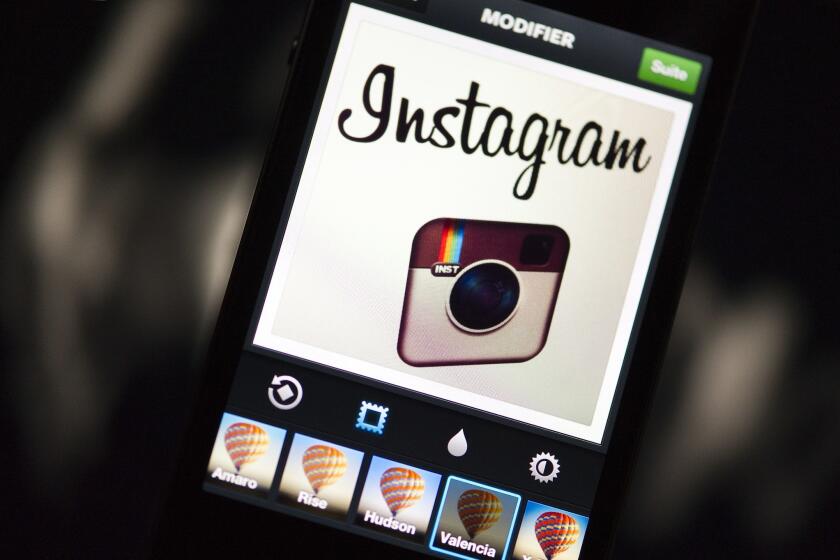 The Instagram app is displayed on a smartphone in December 2012.