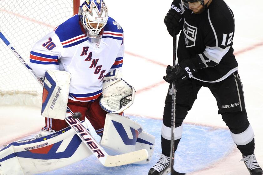 Rangers goalie Henrik Lundqvist stops a shot that was deflected by Kings right wing Marian Gaborik in the second period.