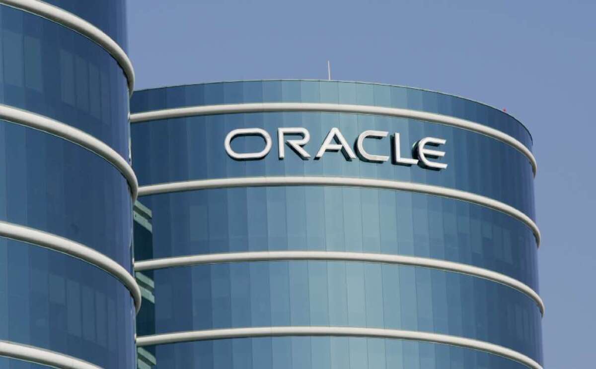 The husband of an Oracle Corp. employee is accused of trading on inside information he learned from his wife's work telephone calls.
