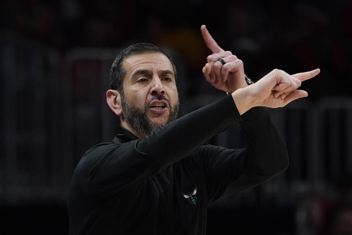 James Borrego points in opposite directions