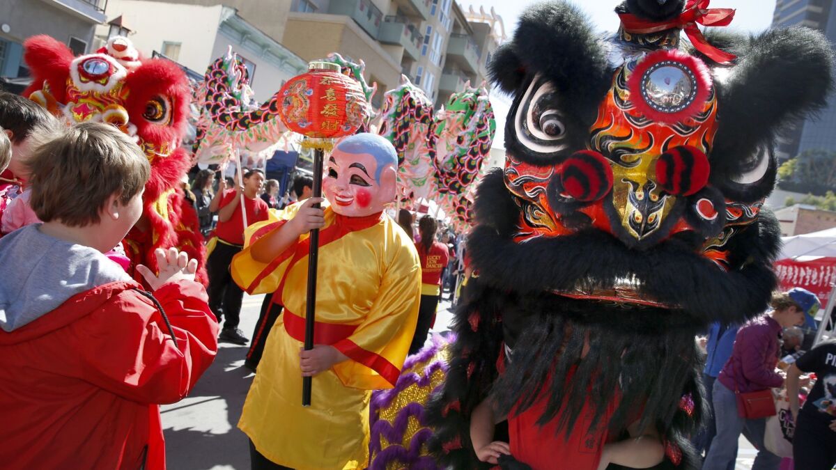 Lucky Lion Dancers entertain attendees of the 36th annual Chinese New Year Fair held in downtown San Diego.