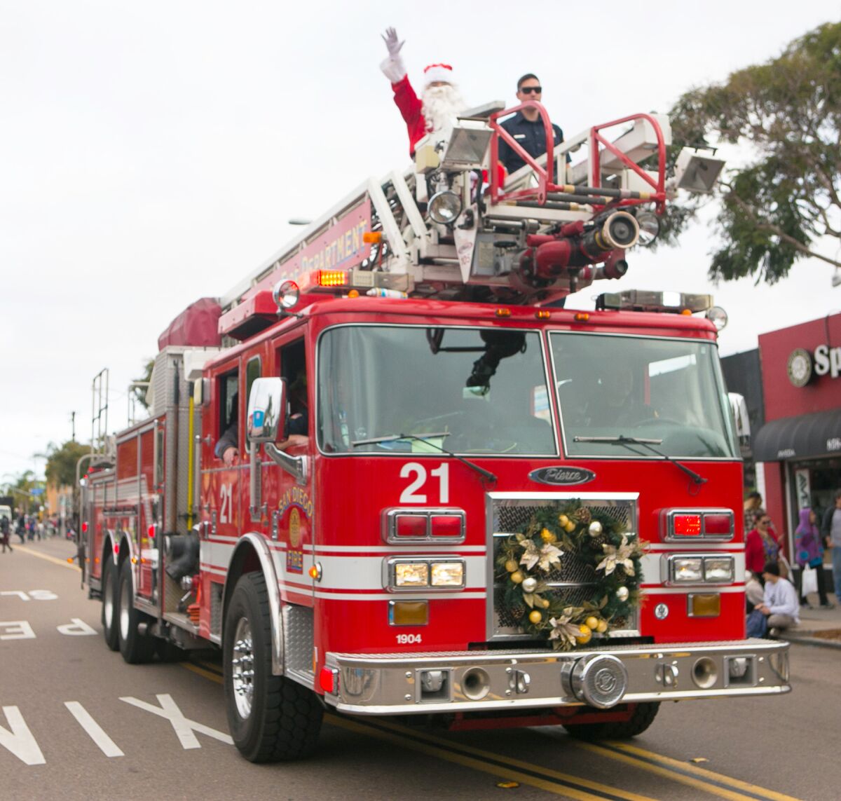 The crew at Fire Station No. 21 helped Santa Claus make an appearance in a previous Pacific Beach Holiday Parade.