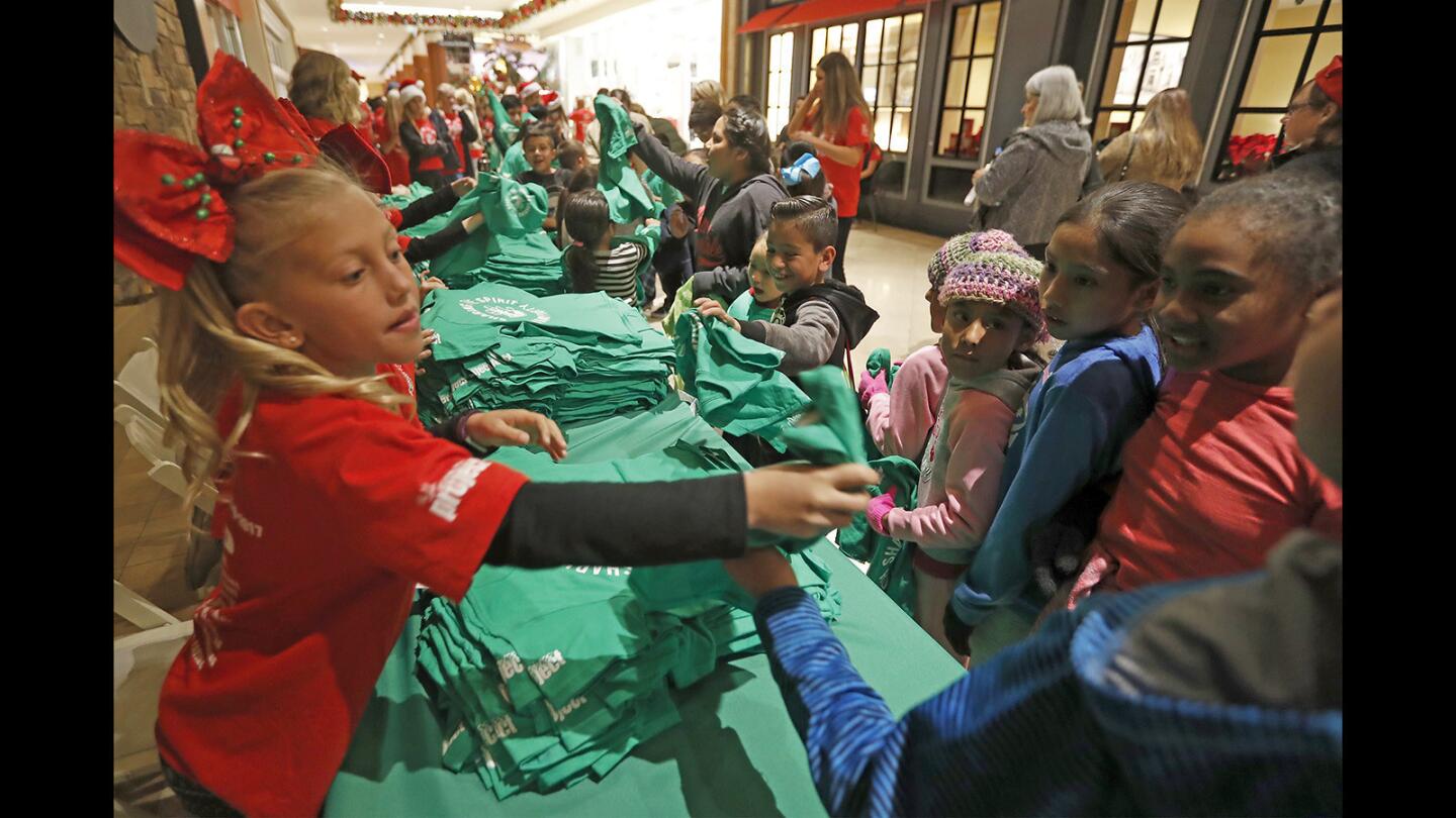 Photo Gallery: Eleventh annual “Sharing the Spirit Holiday Party” at South Coast Plaza