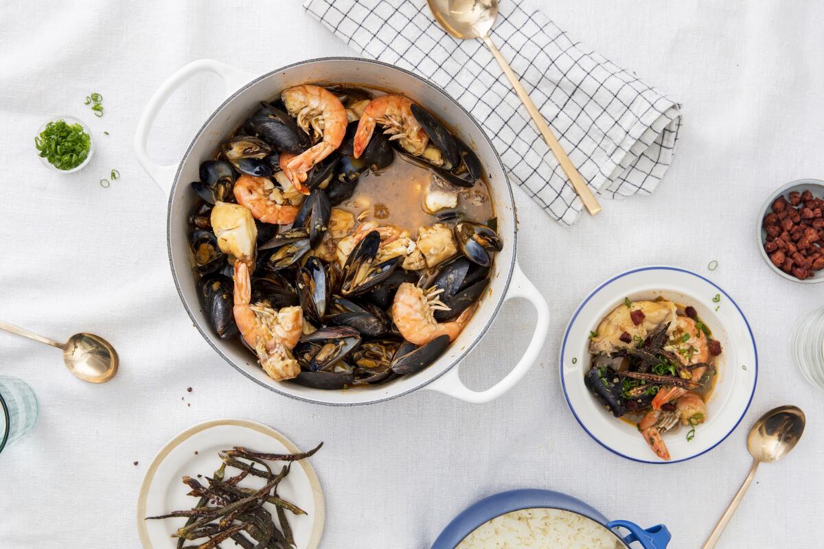 Andouille sausage permeates the broth for steaming mussels, shrimp and snapper fillets in this one-pot New Orleans-style dish. Prop styling by Rebecca Buenik.