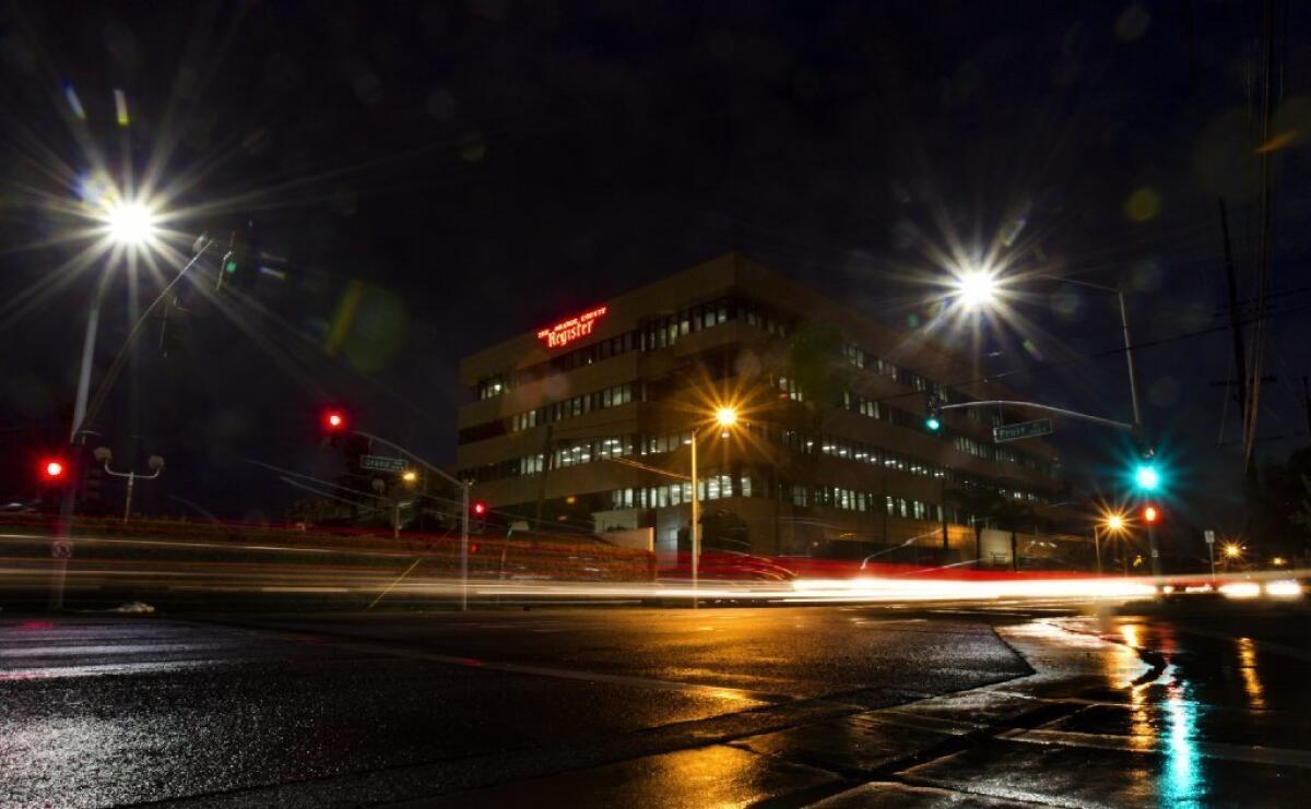 The Orange County Register building in Santa Ana is shown. The company is seeking to buy life insurance on its employees, not to benefit the employees' families, but to benefit the company's pension plan.