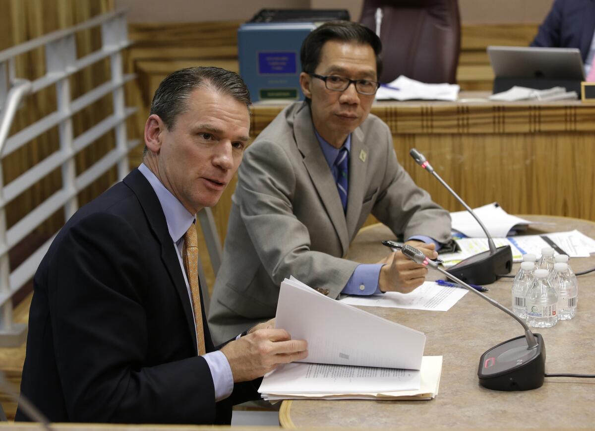 Alastair Mactaggart, left, the sponsor of a proposed internet privacy initiative, backed a similar bill by Assemblyman Ed Chau (D-Arcadia).