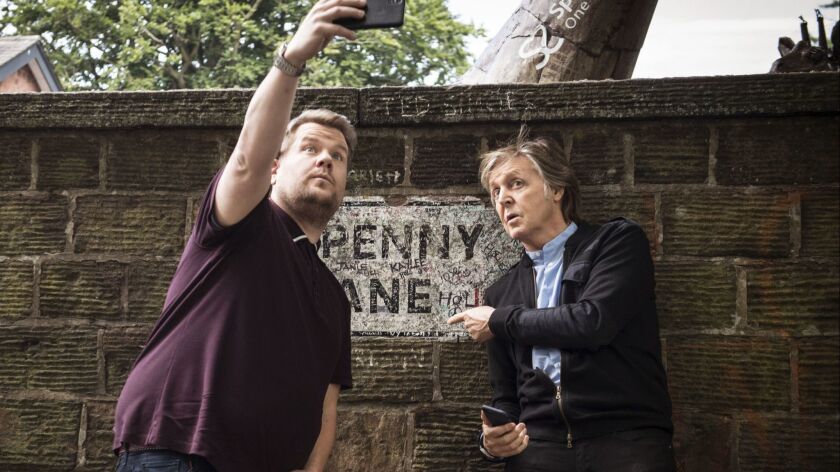Paul McCartney joins host James Corden as they take a selfie on Penny Lane during the "Carpool Karaoke" segment on "The Late Late Show With James Corden."