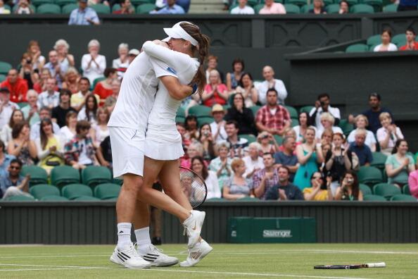 Jurgen Melzer of Austria and Iveta Benesova of the Czech Republic celebrate championship point after winning their final round mixed doubles match against Mahesh Bhupathi of India and Elena Vesnina of Russia on Day Thirteen of the Wimbledon Lawn Tennis Championships at the All England Lawn Tennis and Croquet Club on July 3, 2011 in London, England.