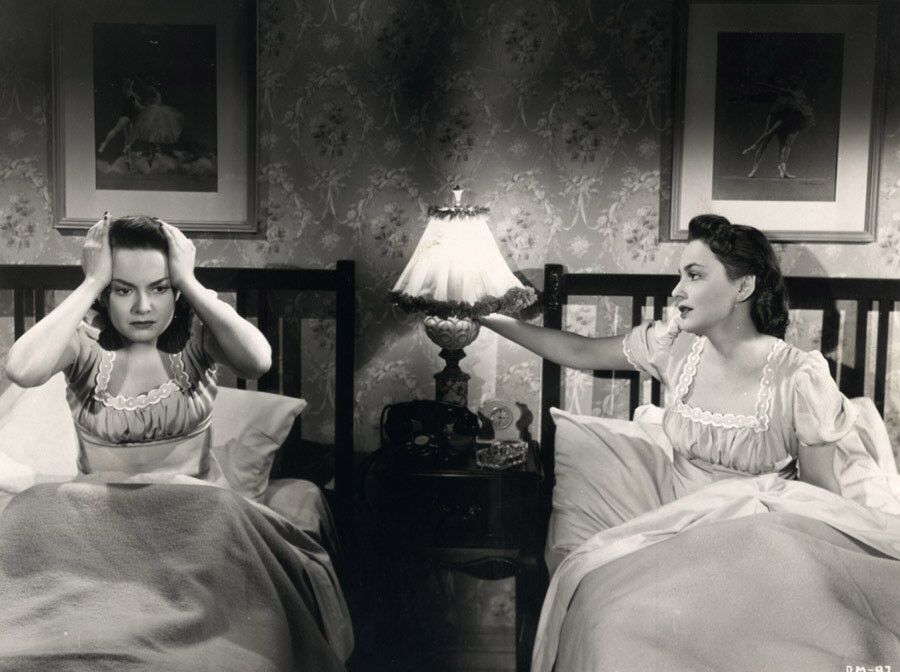 Olivia de Havilland played two roles in the story of an innocent woman accused of murder in 1946's "The Dark Mirror."