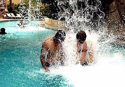 At Mandalay Bay's 11-acre "water feature," hotel guests can float leisurely on a lazy river, stop under an occasional waterfall for a little heady fun, or get swept to "shore" by artificial waves.