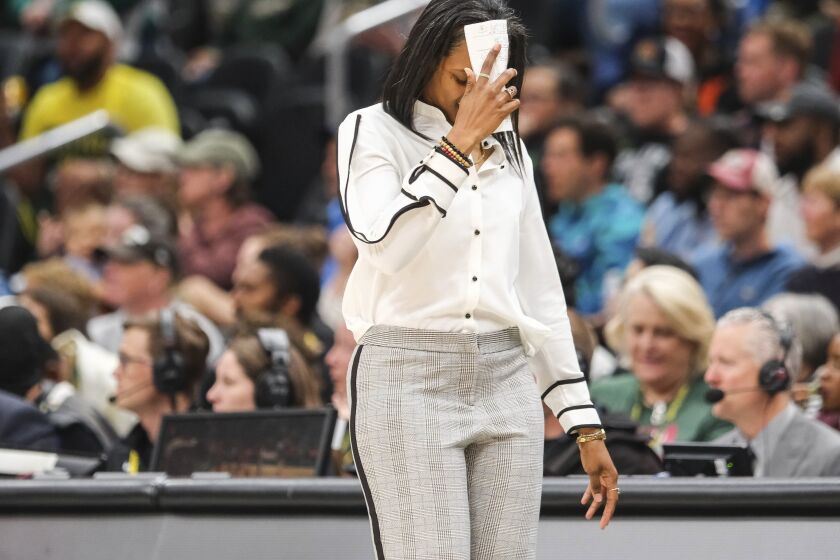 Seattle Storm coach Noelle Quinn reacts to play late in the team's WNBA basketball game against the Washington Mystics on Friday, June 9, 2023, in Seattle. (Dean Rutz/The Seattle Times via AP)