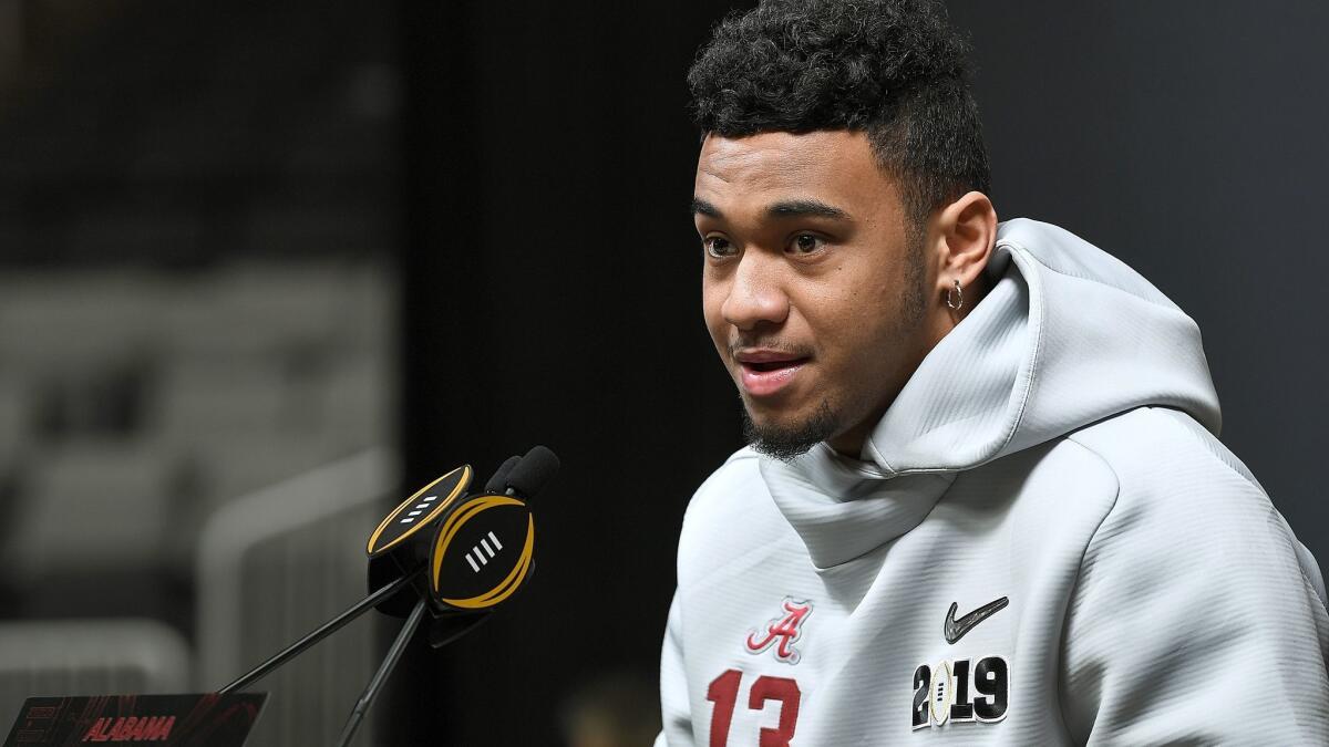 Alabama quarterback Tua Tagovailoa speaks to the media during the College Football Playoff media day at SAP Center on Saturday in San Jose,.