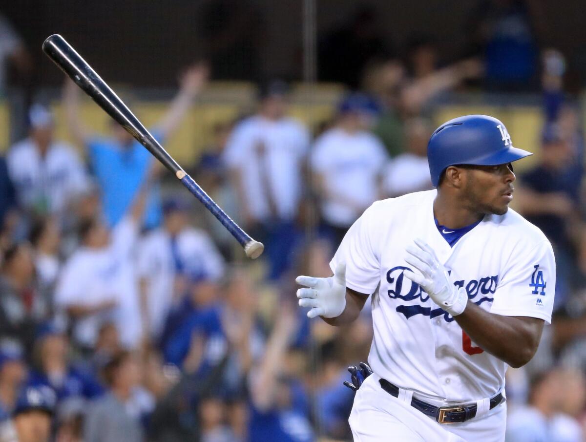 LOS ANGELES, CA - MAY 18: Yasiel Puig #66 of the Los Angeles Dodgers reacts to his two run homerun to take a 3-1 lead over the Miami Marlins during the second inning at Dodger Stadium on May 18, 2017 in Los Angeles, California. (Photo by Harry How/Getty Images) ** OUTS - ELSENT, FPG, CM - OUTS * NM, PH, VA if sourced by CT, LA or MoD **