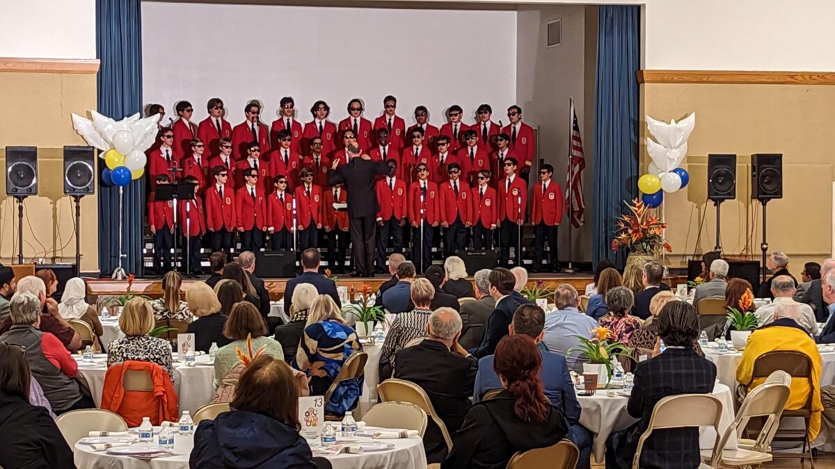 The All American Boys Chorus performs at the Newport Mesa Irvine Interfaith Council's National Day of Prayer breakfast.