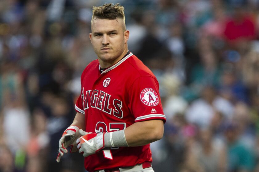 SEATTLE, WA - JULY 20: Mike Trout #27 of the Los Angeles Angels of Anaheim stands at home plate after striking out to end the seventh inning against the Seattle Mariners at T-Mobile Park on July 20, 2019 in Seattle, Washington. (Photo by Lindsey Wasson/Getty Images)