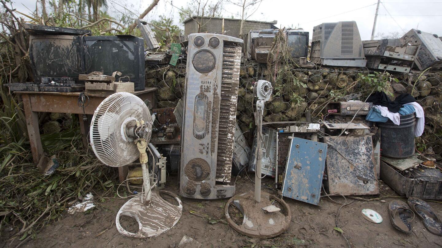 Electronic devices stand near an office destroyed by Hurricane Matthew in Les Cayes, Haiti, on, Oct. 6, 2016.