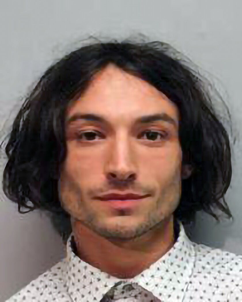 This photo provided by the Hawai'i Police Department shows actor Ezra Miller who was arrested and charged for disorderly conduct and harassment after an incident at a bar in Hilo. Miller known for playing "The Flash" in "Justice League" films was arrested Sunday after an incident at a Hawaii karaoke bar, where police say he yelled obscenities, grabbed a mic from a singing woman and lunged at a man playing darts. (Hawai'i Police Department via AP)