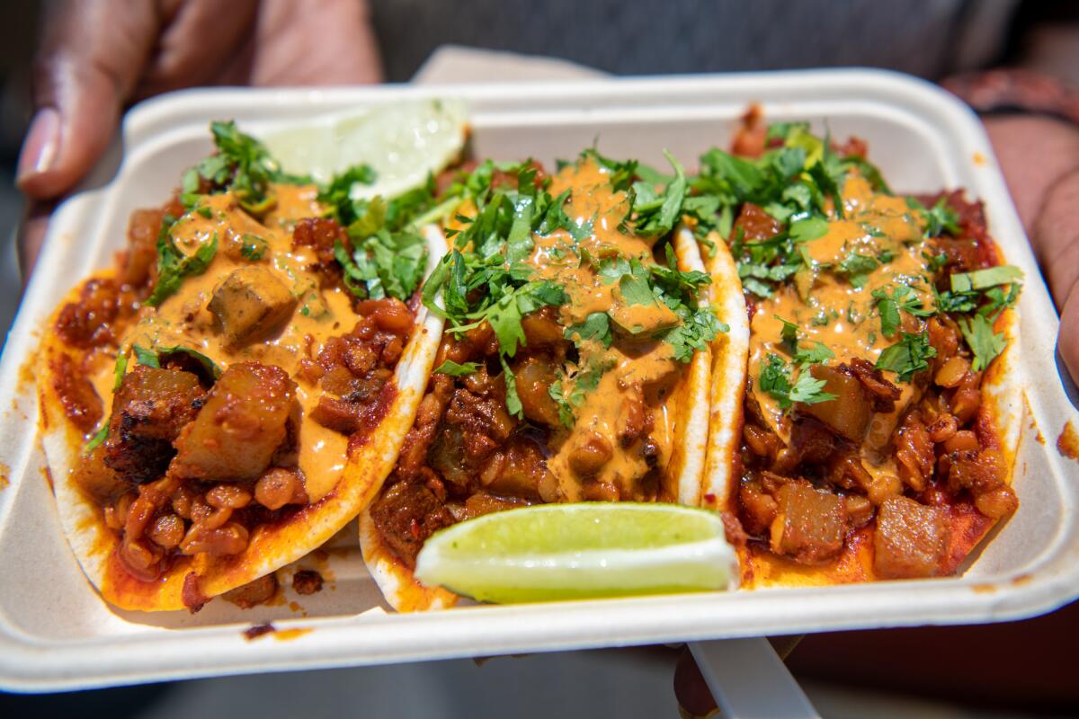 LOS ANGELES, CA - JULY 4, 2021: ET twist tacos at Berbere at the July Fourth reopening of Smorgasburg L.A. The downtown L.A. outdoor food market brings back a majority of its vendors and introduces new ones. Smorgasburg L.A. will run from 10 a.m. to 4 p.m. on Sundays. (Michael Owen Baker / For The Times)