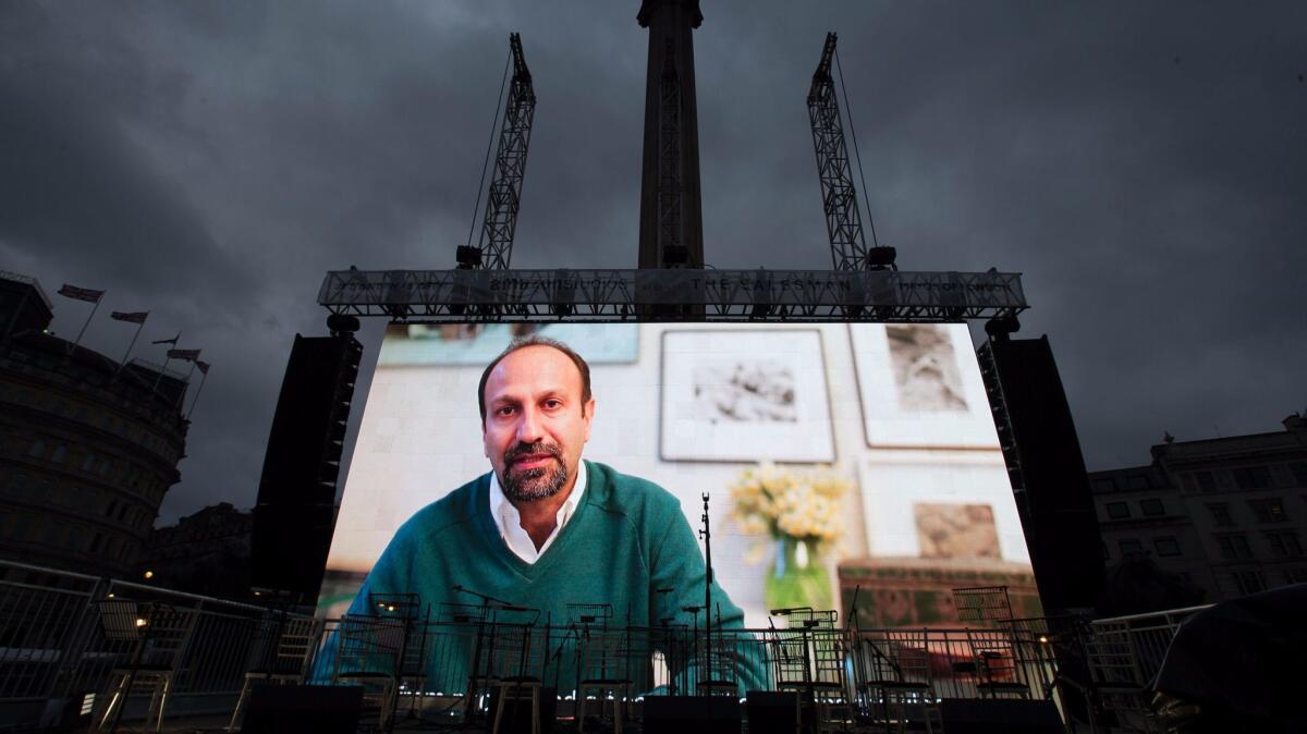 Iranian filmmaker Asghar Farhadi in a videotaped message during a public screening of "The Salesman" in Trafalgar Square in London.
