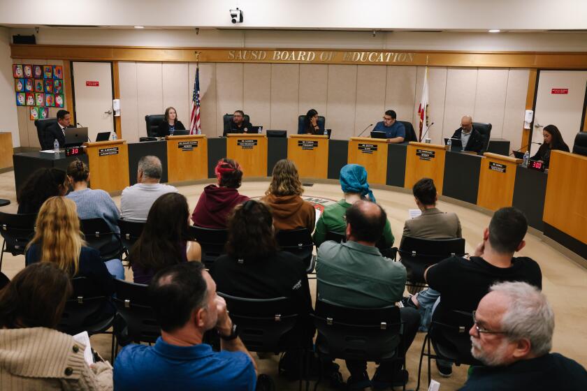 Santa Ana, CA - June 13: Opening statements are made during a board meeting at the Santa Ana Unified School District Board Room on Tuesday, June 13, 2023 in Santa Ana, CA. Two recently approved ethnic studies classes have been at the center of renewed controversy as they prepare lessons on the Israeli-Palestinian conflict. Pro-Israel groups criticize the classes for presenting a one-sided view of Jews and the Middle Eastern nation. Pro-Palestinian advocates support the classes for what they view as a fair and accurate treatment of the conflict. The district continues meeting with all sides but has not announced any changes to the proposed classes. (Dania Maxwell / Los Angeles Times).