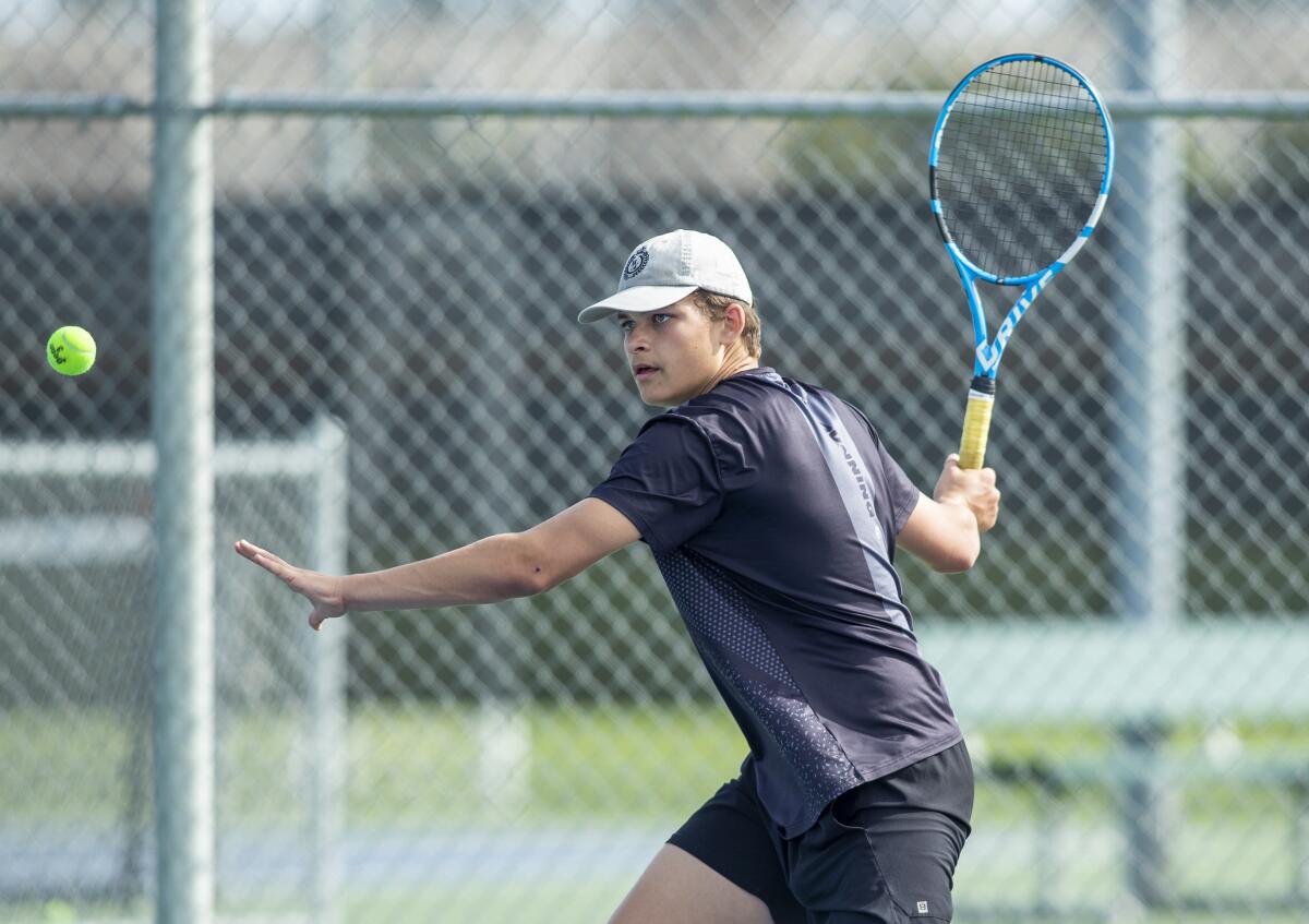 Estancia's Tyler Nofts returns a forehand during a Battle for the Bell match at Costa Mesa High School on Tuesday.