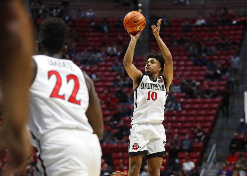 SDSU sophomore guard Keith Dinwiddie Jr. shoots in an exhibition against University of Saint Katherine at Viejas Arena.