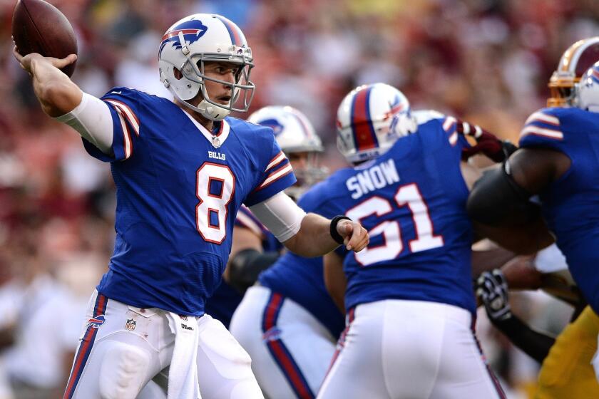 Jeff Tuel throws to a receiver against the Washington Redskins during a preseason game at FedEx Field in Landover, Md.