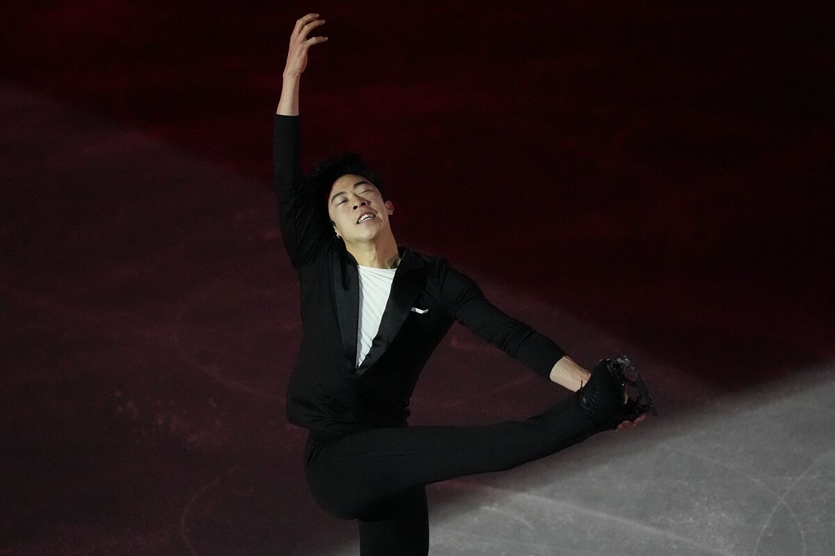 Nathan Chen, of the United States, performs during the figure skating gala at the 2022 Winter Olympics, Sunday, Feb. 20, 2022, in Beijing. (AP Photo/David J. Phillip)