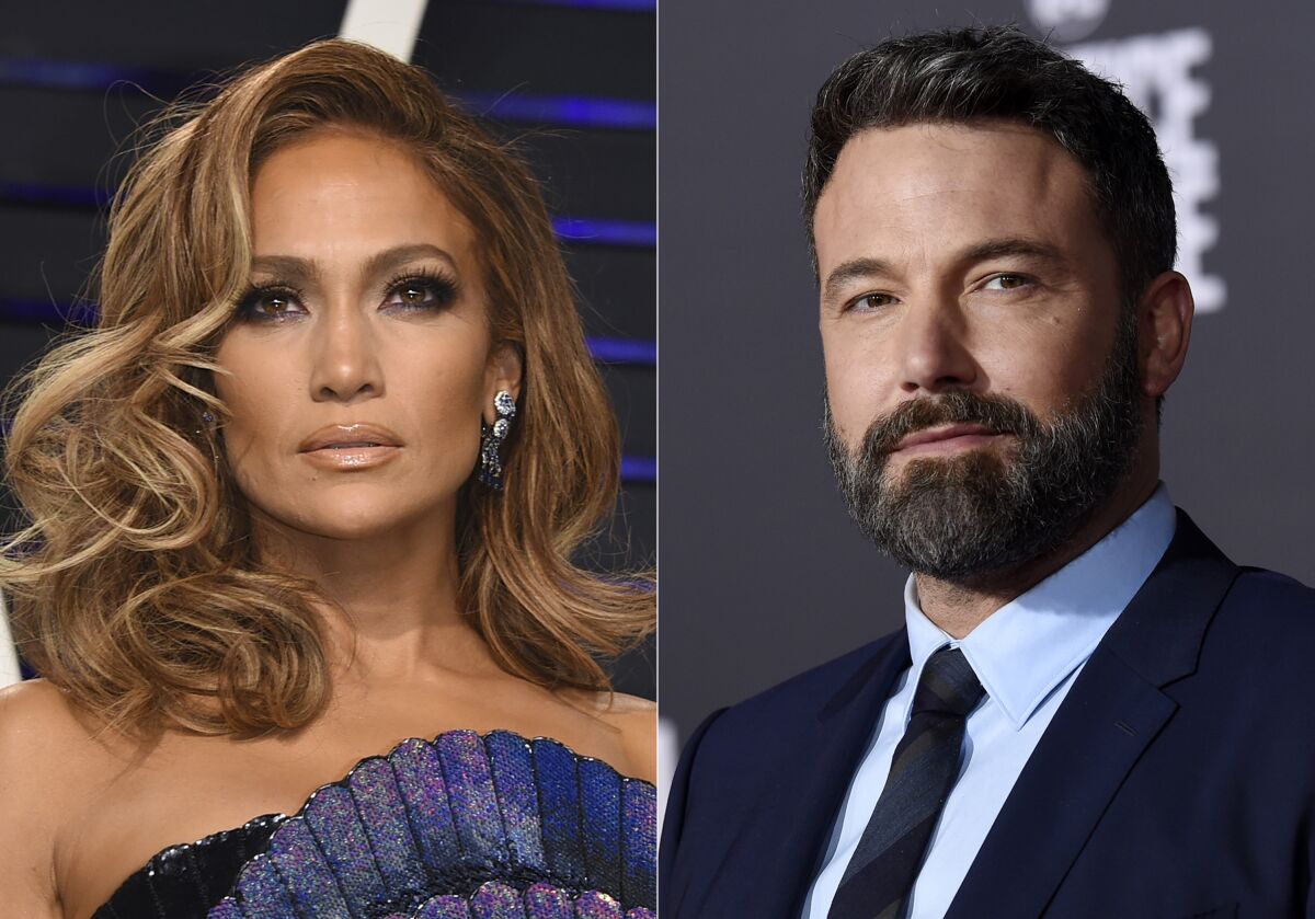 Jennifer Lopez arrives at the Vanity Fair Oscar Party in Beverly Hills, Calif., on Feb. 24, 2019, left, and Ben Affleck appears at the premiere of "Justice League" in Los Angeles on Nov. 13, 2017. The A-listers rekindled their romance 17 years after they broke up in 2004. (AP Photo)
