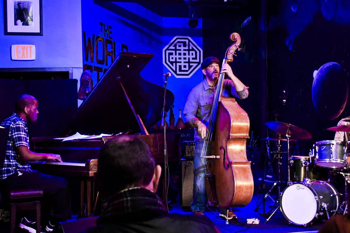 Bassist Eric Revis, pianist Joshua White and drummer Clarence Penn onstage