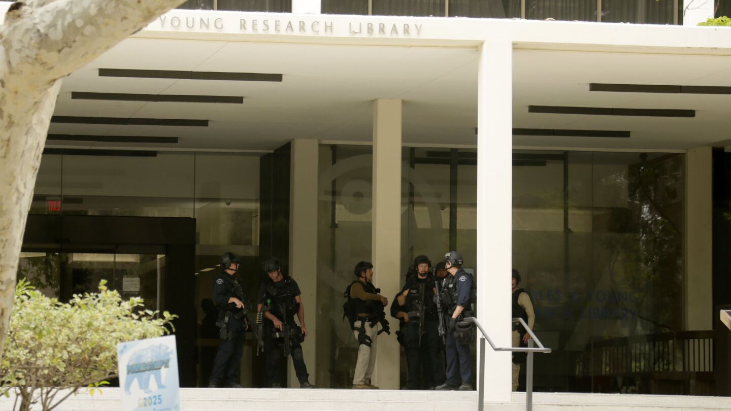 Police officers respond to a shooting at UCLA on Wednesday morning.