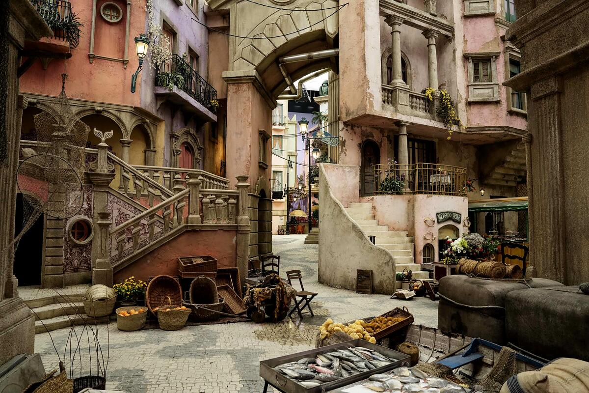 Old buildings and market stalls fill the Lisbon set of "Poor Things."