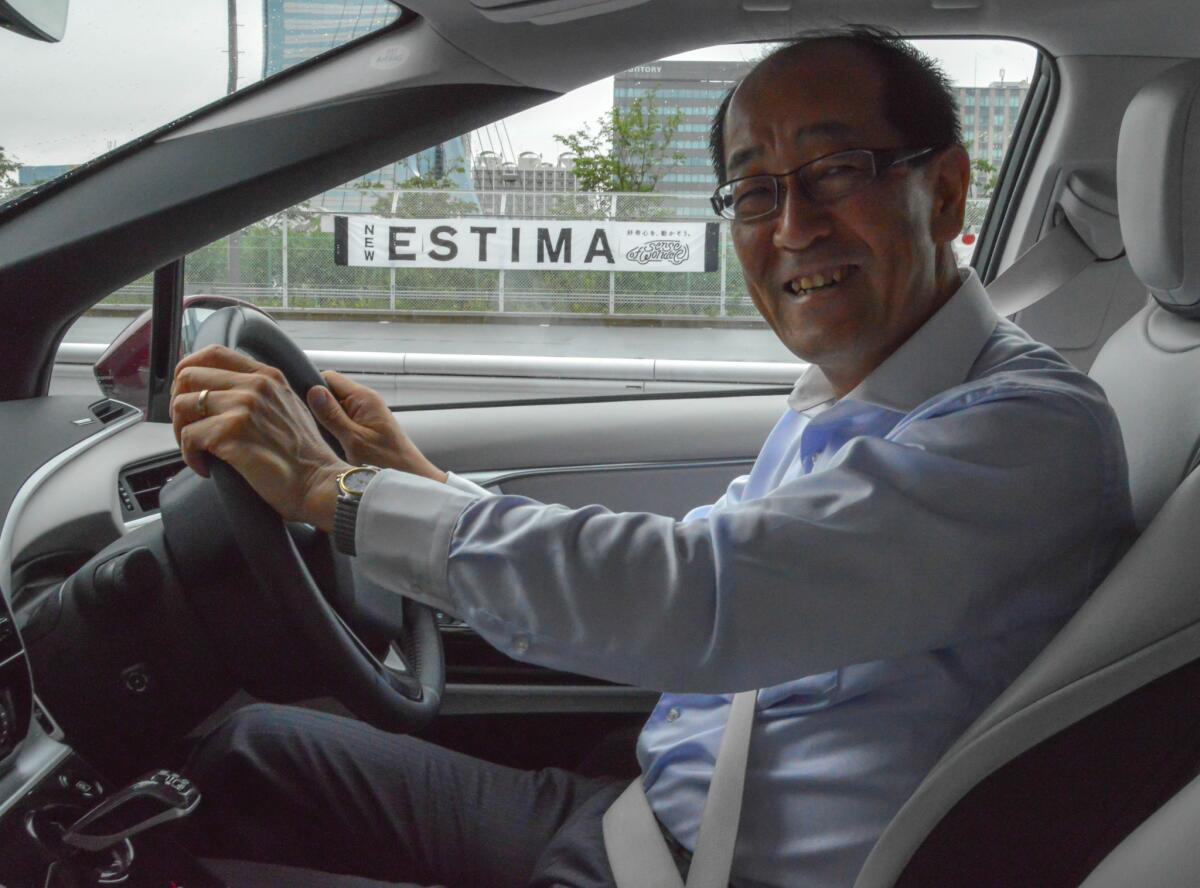 Yoshikazu Tanaka, chief engineer of the Toyota Mirai, behind the wheel of the hydrogen-powered car.