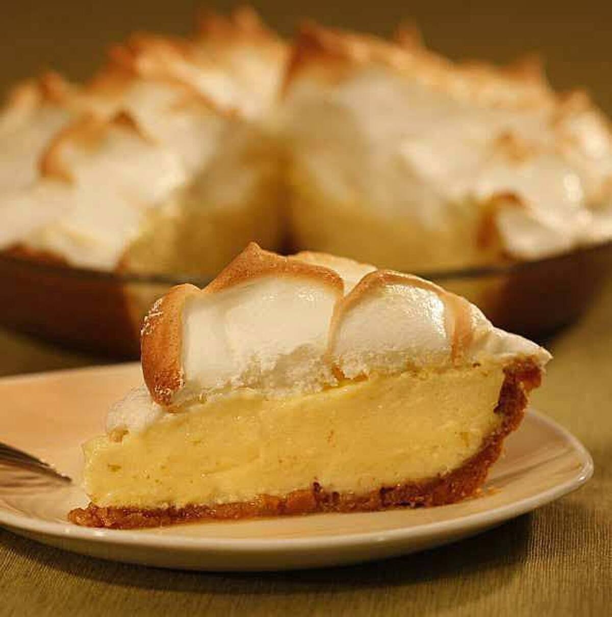 Key lime pie topped with meringue.