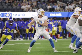 Chargers quarterback Max Duggan looks to pass against the Rams in a preseason game.