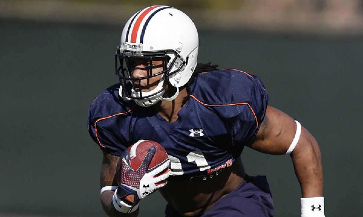 Auburn running back Tre Mason takes part in a team practice session Thursday in preparation for Monday's BCS championship game against Florida State. Mason is one of 18 Floridians on the Tigers' roster.